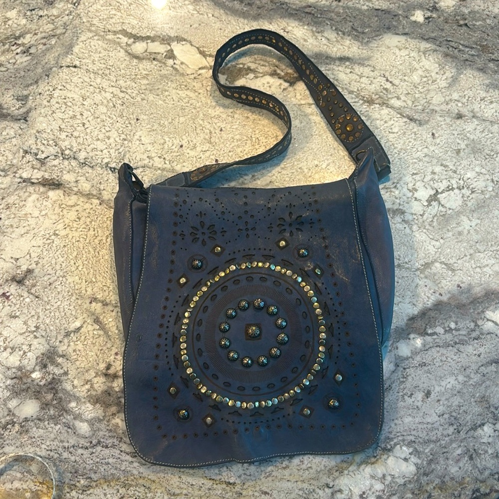 Langoletti studded leather purse.